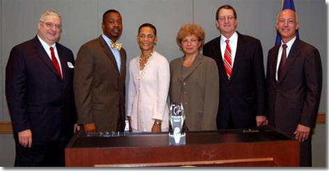 <em>From left to right: Albert K. Blackwelder of Emory Crawford Long Hospital, Anthony L. Burfoot,<br> 
Vice Mayor of The City of Norfolk, Chair Earp, Francine M. Tishman of Abilities, Inc., Ronald R. <br>
Peterson of Johns Hopkins Health System, Richard J. Morgante of the IRS.</em