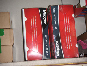 img1 - Supplies stored in overhead bins and storage cabinets in OIT