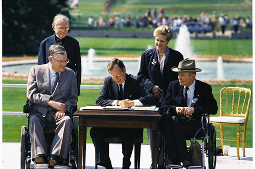 President George H.W. Bush signing the ADA
