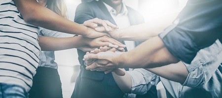 group of people demonstrating team work